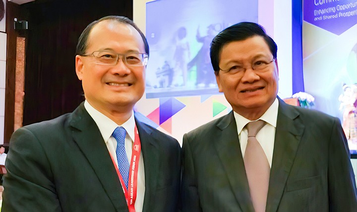 老挝国家主席通伦•西苏里会晤联盟主席蔡冠深